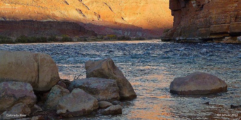 Horizonte 117.jpg - shows the mighty Colorado-River near Lee's Ferryin Arizona just before sunset. The water already in theshadow makes a cool accent to the bright red rockfaces above.Geographically Lee's Ferry is halfway between Lake Powell andthe Grand Canyon.   click here for Google Maps View   Position: N36°51'31" W111°36'17", elev.955m/3140ft Camera Lumix TZ 20, date: 10/11/2012, 16:47 local (MST)