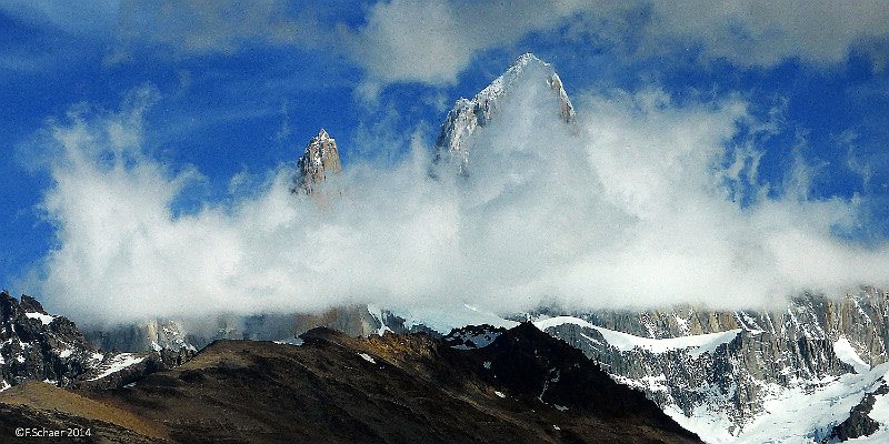 Horizonte 130.jpg - famous Mount Fitz Roy in the Patagonian Andes,adjacent to the Argentina/Chile-Border. Mt. Fitz Roy is a realchallenge for climbers, extremly steep and sudden weather changes.I made this picture on a long but fantastic walk from the newlyvillage of El Chaltén (Argentina), the gateway to Mt. Fitz Royand many other sharp peaks in the area.   click here for Google Maps View   Position (Peak): S49°16'13" W73°02'47", elev. 3406m/11200ft Camera: Lumix TZ41, date: 17/01/2014, 11:51 local