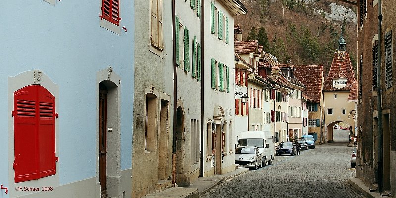 Horizonte 146.jpg - main road in the medevial village of St. Ursannein Switzerland, adjacent to the French Border. Mentionedfirst in 849, St. Ursanne became a part of France but wentback to Switzerland 1815.   click here for Google Maps View   Position: N47°21'55" E07°09'18", elev.440m/1450ft Camera: Nikon D50, zoom 18-55, date: 09/03/2008, 12:32 local