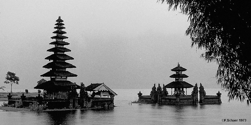 Horizonte 163.jpg - made long ago at one of our very early adventure-trips. It shows the Pura Ulun-Danu Temple beside Lake Bratan in central Bali (Indonesia)during a heavy tropical rain within the misty fog-covered mountains. ThisHindu-temple is one of the best known Landmark for the hinduistic Balinese.The old Kodachrome II-slide I've digitalized and converted to black and white.   click here for Google Maps View   Position: S08°16'30" E115°10'10", elev.1240m/4075ft Camera: Pentax Spotmatic 1,8/55mmm, date: January 1973
