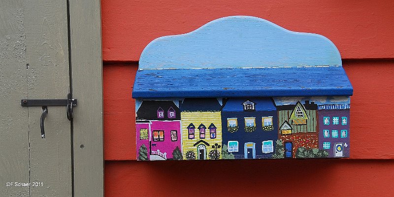 Horizonte 201.jpg - a typical wooden mailbox in the center of St.John's,the capital of the province of Newfundland and Labrador, Canada.You may still find many of such handmade mailboxes in this city.   click here for Google Street View   Position: N47°34'12,33"/W52°42'04,92", elev.23m/75ft  Camera: Nikon D200, 55m lens, date: 17/06/2011, 13:52 local time