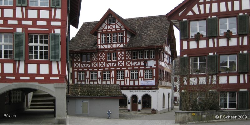 Horizonte 31.jpg - a view to the well restored old historic center of Bülach in northern Switzerland, where I was born 75 years ago. The building on the left is the municipal house, (built 1672) home of the local council. The elaborate red framework is typical for this part of the country. Bülach was first mentioned in the year 811!   click here for Google Maps View   Position: N47°31'03" E 08°32'28,60" Elev. 417m/1370ft Camera: Canon Ixus80