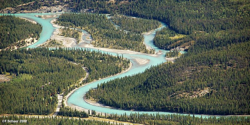Horizonte 348.jpg - the young Athabasca-River just south of Jasper, Alberta.The Athabasca has it source at the Columbia Icefield within the Rocky-Mountains. The River-System drains about 100'000km2/40'000 squaremilesand was an important route in the past centuries for the explorationof Canada's Northwest and Alaska.Position: N 52°51'40"/ W 118°04'00", elevation: 1050m/3500ft above SL.Camera: Nikon D50 with Nikkor 55-200mm, date: 05/10/2008, time: 10:40