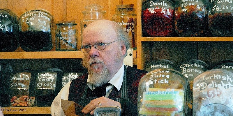 Horizonte 373.jpg - an old- fashioned shopkeeper in his traditionalGrocery-store in the historic Goldrush-town of Barkervillein central British Columbia. Barkerville was founded 1862,is well restored and listed as a National Historic Site!(I flew more than 30 times with Visitors to Barkerville)Position: N 53°04'01"/ W 121°31'01", elevation 1290m/4240ftCamera: Nikon D200, Nikkor-Zoom, date: 09/09/2011, 13:27.