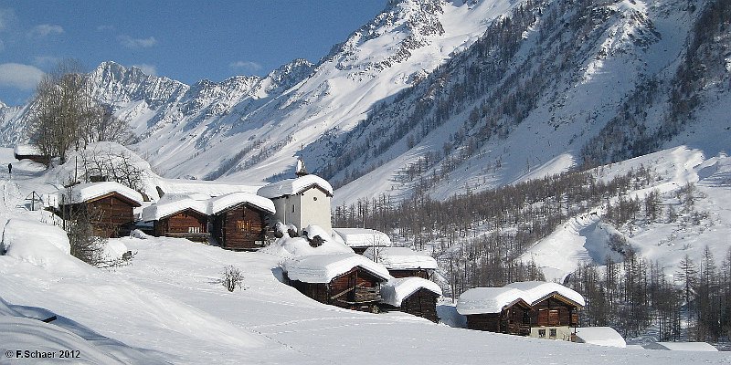 Horizonte 427.jpg - the pittoresque Hamlet of Eisten, in Loetschental Switzerland. The chapel in the centre was erected 1677 in Honour of St. Wendelin .Eisten is a part of the rural commune of Blatten, known for Tourism.Position: N 46°25'26" E 07°49'32", elev.1810m/5500ft above SL,date: Feb.11/2012