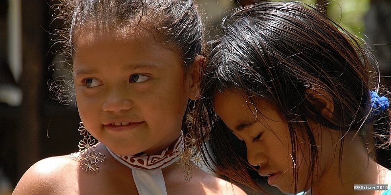 Horizonte 72.jpg - made in the very small village of Hapatoni in the southern part of the island of Tahuata (Marquesas Group, Polynésie Française), showing two lovely dancers. The original polynesian music was performed by their parents and relatives.They offered a delicate performance between old trees outside of the village (about 80 inhabitants). Remember this, I still get goose-bumbs when I remember this innocent show of the two young girls, living at the edge of the world...   click here for Google Maps View   Position: S09°58'10" W139°07'19", elevation 33m/100ft Camera: Nikon D200, Zoom at 200 mm, date: Nov.28/2010